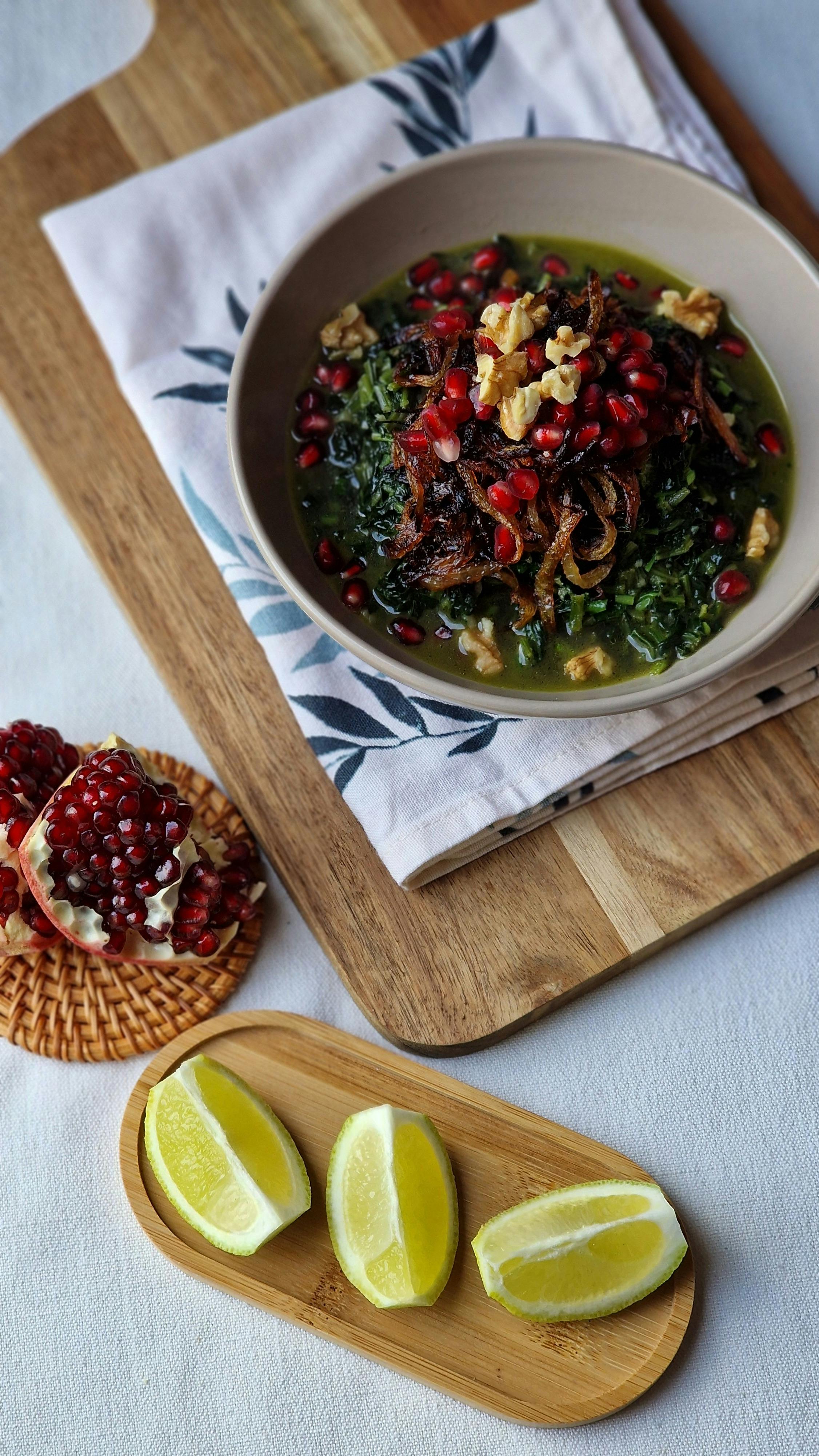 Roasted vegetable platter with herbs and green sauce